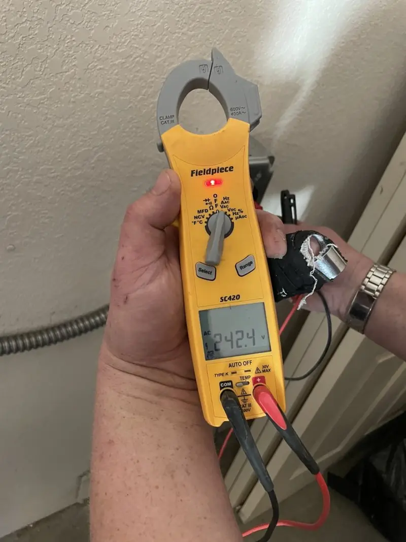 Voltage testing with clamp meter during Generator Installation in American Fork